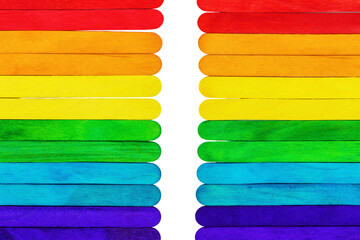 colorful wooden sticks on white background, lgbt concept