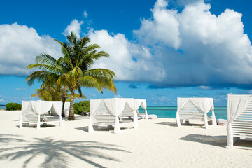 Chill lounge zone on the sandy beach, Maldives island