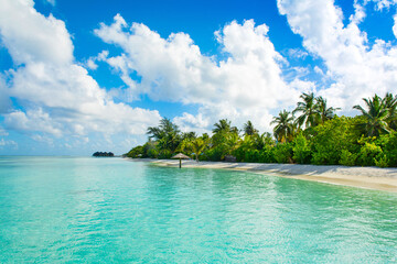 Beautiful cloudy panoramic landscape of sandy beach in Indian ocean, Maldives