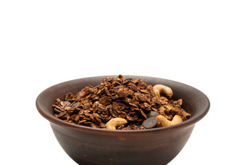 Chocolate granola cereal with nuts in a bowl background.