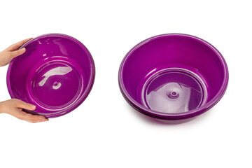 Purple hand basin in woman hands isolated on white background.