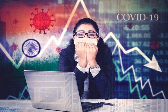 Scared businessman with declining finance chart