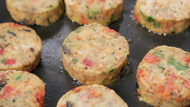 Vegetable diet cutlets carrots of potato, zucchini, tomato pepper. Tasty vegetarian cutlets. Healthy food.