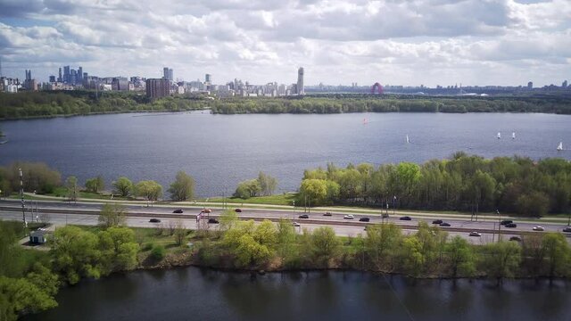 Amazing high angle top drone view on Strogino and Shchukino	district which are situated in beautiful green river park.
