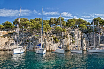 Fototapeta na wymiar Sailboats in a calanque between Marseille and Cassis, France