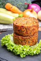 Round vegetarian patties or burgers made from grains, vegetables and legumes