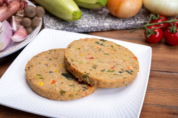 Round vegetarian patties or burgers made from grains, vegetables and legumes