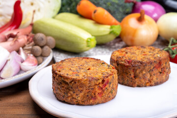 Round vegetarian patties or burgers made from grains, vegetables and legumes