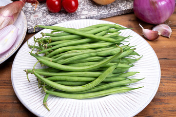 Fresh uncooked green beans haricot verts legumes
