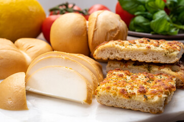 Cheese collection, Italian yellow smoked caciocavallo or scamorza cheese