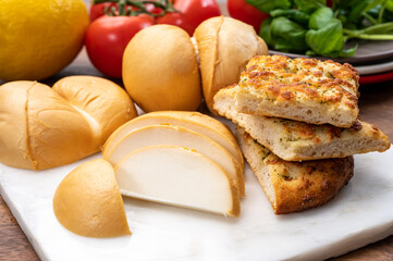 Cheese collection, Italian yellow smoked caciocavallo or scamorza cheese