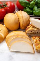 Cheese collection, Italian yellow smoked caciocavallo or scamorza cheese