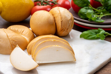 Cheese collection, Italian yellow smoked caciocavallo or scamorza cheese