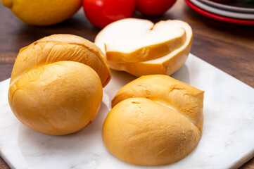 Cheese collection, Italian yellow smoked caciocavallo or scamorza cheese