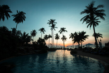 Fototapeta na wymiar Twilight on a asian tropical sea beach.