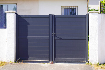 portal steel high grey metal gate fence on modern house door