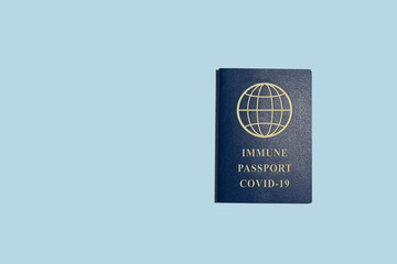 Covid-19 global Immune Passport with golden letters and Globe icon isolated on a blue background. the сonfirmation that a person has been vaccinated from Coronavirus 