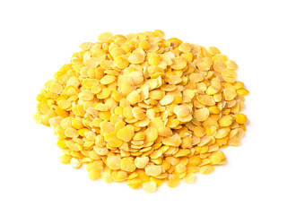 handful of split yellow lentils closeup on white
