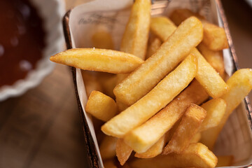 French fries on table background