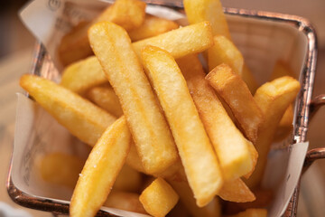French fries on table background