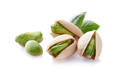 Pistachio with leaves on white background