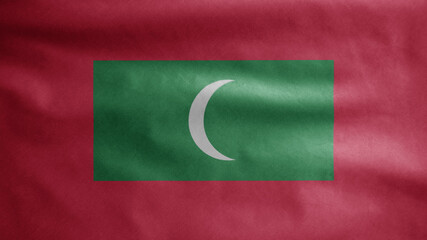 Maldivian flag waving in the wind. Maldives banner blowing soft silk