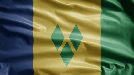 Vincentian flag. Saint Vincent and Grenadines banner blowing soft silk.