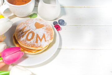 Mothers day Brunch restaurant invitation concept. Various Moms Womans Day Menu background, with traditional breakfast and lunch food and drink set, with flowers on sunny white wooden background