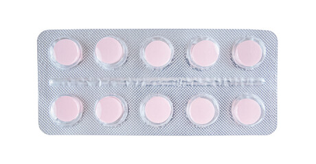 Pink tablets in blister isolated on white background.