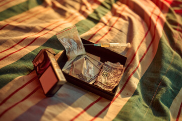 Obraz na płótnie Canvas Drug addicts set, syringe, cigarettes and money