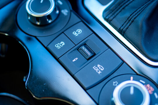 Air suspension control module inside german car. Normal mode, lock mode, auta start/sop