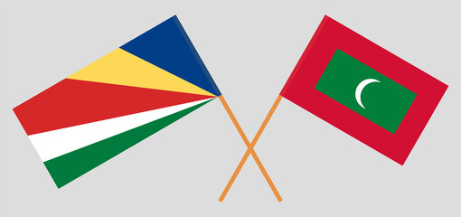 Crossed flags of Seychelles and Maldives. Official colors. Correct proportion