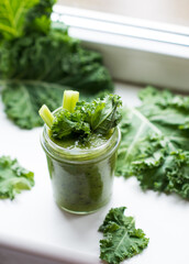 Green detox cocktail with cale salad, vegetarian healthy smoothie in a jar