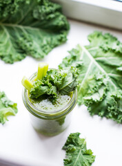 Green detox cocktail with cale salad, vegetarian healthy smoothie in a jar