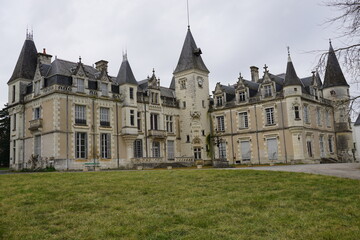 Fototapeta na wymiar old limestone castle in the park in the Loire valley, France