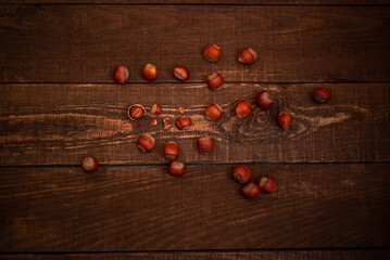 hazelnuts on the wooden background