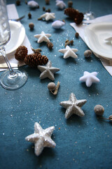 christmas table setting with stars hollidays decoration