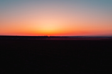 Spring pink sunset in the sky.