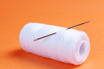 needle and sewing thread sew