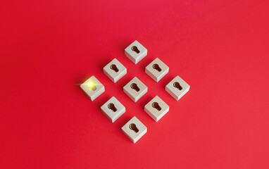 Glowing light bulb among others off. Select the best idea. Investment in a promising successful...