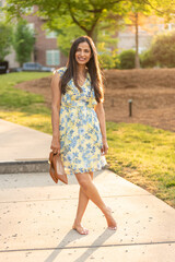 Naklejka premium Full length images of beautiful Asian Indian woman in the park.