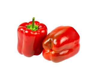 Two red bell peppers close up isolated on white background.