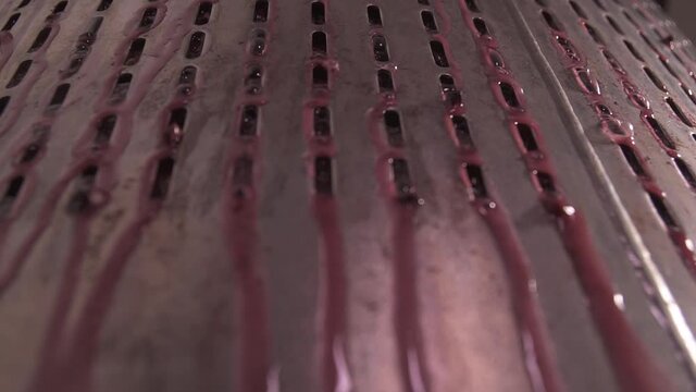 Wine mixing during fermentation process in barrel. Devatting a bowl and marc of loading in the press, with marc pump. 