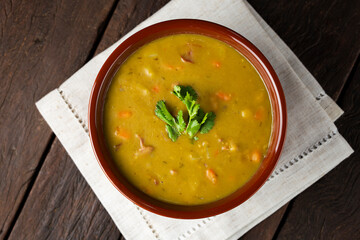 Pea soup. Bowl with pea soup on the table