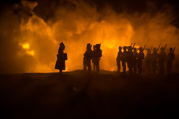 War Concept. Military silhouettes fighting scene on war fog sky background, World War Soldiers...