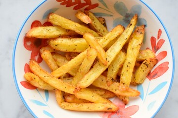 homemade French fries on a bowl
