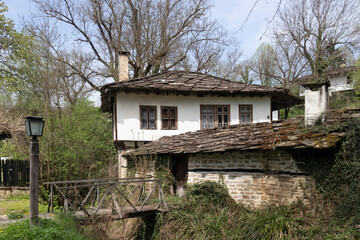 Typical street and old houses at historical village of Bozhentsi,  Bulgaria