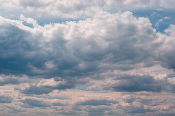 The clouds are white against the blue sky.