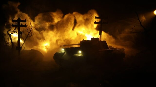 War Concept. Military silhouettes fighting scene on war fog sky background, World War Soldiers Silhouette Below Cloudy Skyline At night. Armored vehicle fight scene. Selective focus