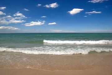 Landscape summer beach background with sunny sky at the sea